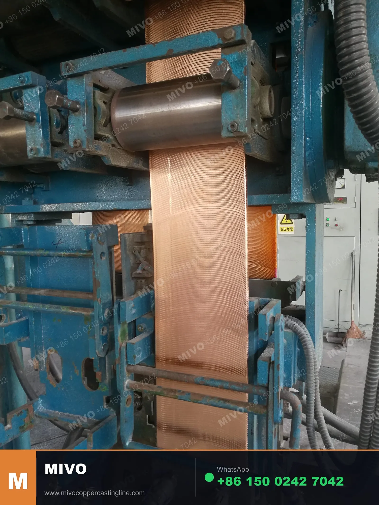 Upward continuous casting — copper busbar emerging from graphite crystallizer